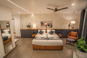 Aura Inn & Suites