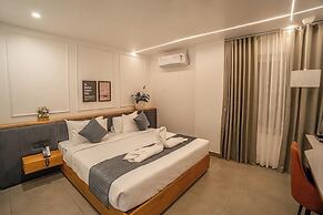 Aura Inn & Suites