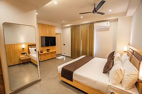 Aura Inn & Suites