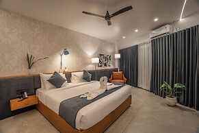 Aura Inn & Suites