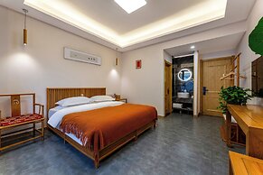 ManBuYunDuan.Theme Inn