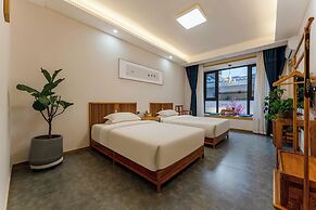 ManBuYunDuan.Theme Inn