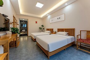 ManBuYunDuan.Theme Inn