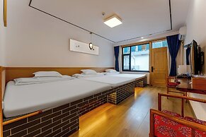 ManBuYunDuan.Theme Inn