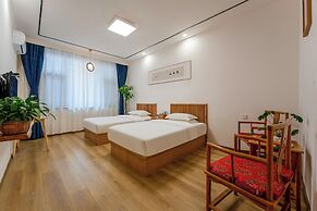 ManBuYunDuan.Theme Inn