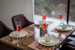 ELIVAAS 1BHK Pine View Resort