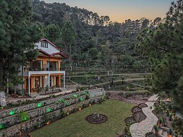 ELIVAAS 1BHK Pine View Resort