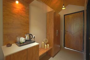 ELIVAAS 1BHK Pine View Resort