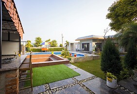 ELIVAAS Aarul Farm 4BHK Villa with Pool