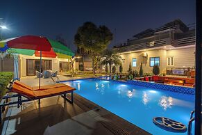 ELIVAAS Aarul Farm 4BHK Villa with Pool