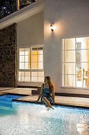 ELIVAAS Varsha Greens 4 BHK with Pool