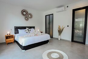 D'Kenyeri Villa by Aayan