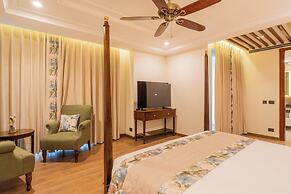 ELIVAAS privé Royce Cottage 4BHK Villa