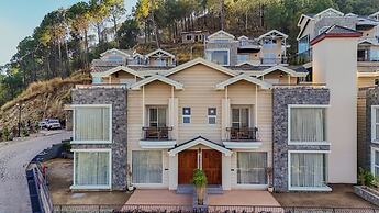 ELIVAAS privé Royce Cottage 4BHK Villa