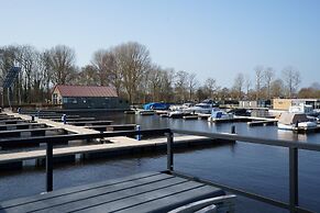 Stylish Boathouse on Lake Sneeker
