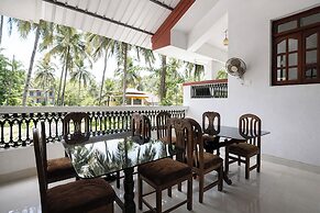 Fabhotel Triple Beach House