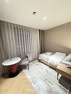 AQ MYRZA Inn