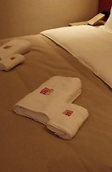 AQ MYRZA Inn