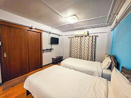 Thepmongkol House