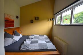 Holiday Home in Forest With Terrace & BBQ
