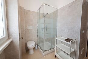 Casa Rosa Beige e Blu