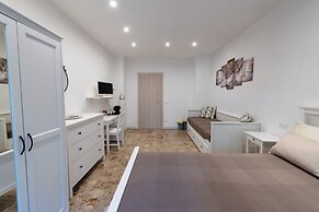 Casa Rosa Beige e Blu