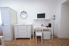 Casa Rosa Beige e Blu