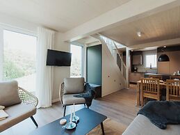 House With Nordic Wood Terrace