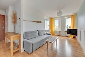 Surfer by Grand Apartments