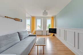 Surfer by Grand Apartments