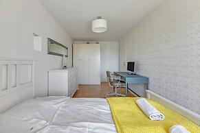Surfer by Grand Apartments