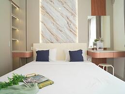 Bright And Homey Studio Room At Apartment Sky House Bsd