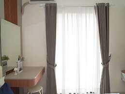 Bright And Homey Studio Room At Apartment Sky House Bsd