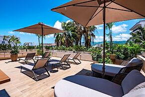 Modern Waterfront Condo With Shared Pool, Balcony, and Washer/dryer