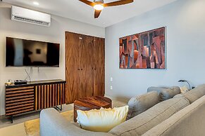 Modern Waterfront Condo With Shared Pool, Balcony, and Washer/dryer