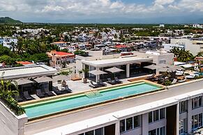Modern Waterfront Condo With Shared Pool, Balcony, and Washer/dryer