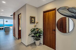 Modern Waterfront Condo With Shared Pool, Balcony, and Washer/dryer