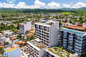 Modern Waterfront Condo With Shared Pool, Balcony, and Washer/dryer
