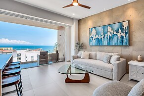 Modern Waterfront Condo With Shared Pool, Balcony, and Washer/dryer