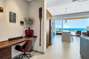 Modern Waterfront Condo With Shared Pool, Balcony, and Washer/dryer