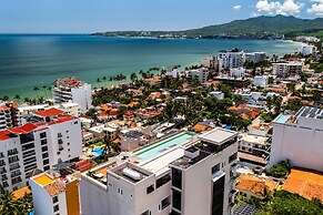 Modern Waterfront Condo With Shared Pool, Balcony, and Washer/dryer