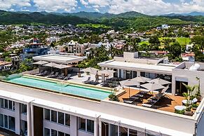 Modern Waterfront Condo With Shared Pool, Balcony, and Washer/dryer