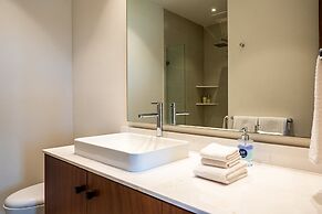 Modern Waterfront Condo With Shared Pool, Balcony, and Washer/dryer