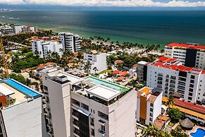Modern Waterfront Condo With Shared Pool, Balcony, and Washer/dryer