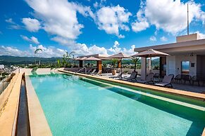 Modern Waterfront Condo With Shared Pool, Balcony, and Washer/dryer