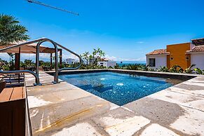 Modern Waterfront Condo With Shared Pool, Balcony, and Washer/dryer