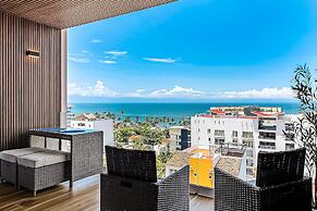 Modern Waterfront Condo With Shared Pool, Balcony, and Washer/dryer