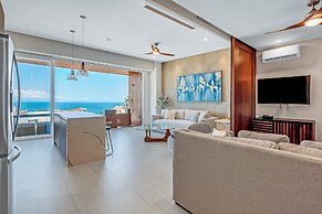 Modern Waterfront Condo With Shared Pool, Balcony, and Washer/dryer