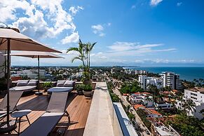 Modern Waterfront Condo With Shared Pool, Balcony, and Washer/dryer