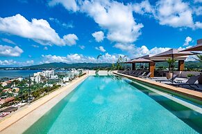 Modern Waterfront Condo With Shared Pool, Balcony, and Washer/dryer